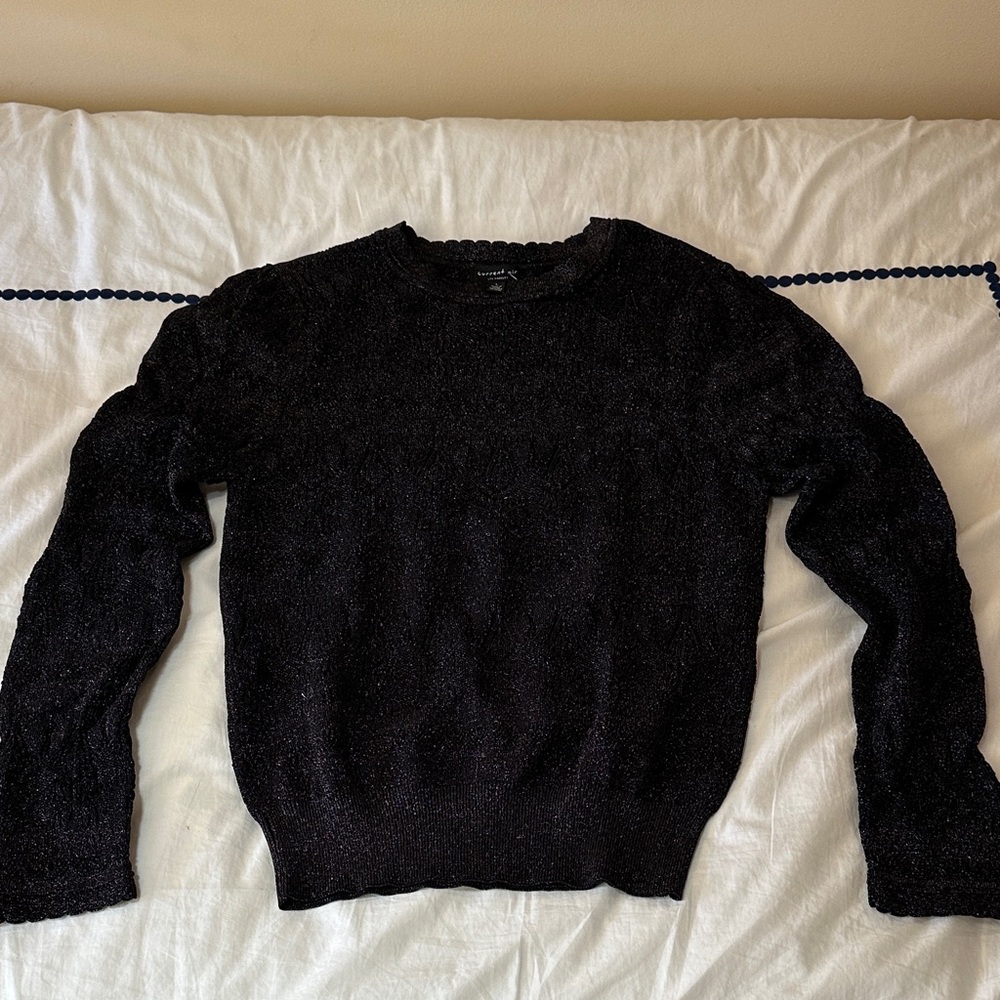 NWT Black sweater with sparkly threads.